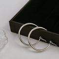 Smooth Classic Hoop Earrings in Two Sizes and Finishes view 3