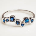 Silver Tone Blue Irregular Bezel Bubble CZ Finger Ring view 1