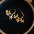 Moon Star and Heart Charm Gold Tone Hoop Drop Earrings view 6