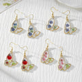 Gold Butterfly Resin Dried Flower Drop Earrings Four view 1