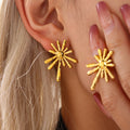 Gold and Steel Hammered Starburst Sun Stud Earrings Pair view 1