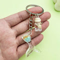 Starfish, Shell and Mermaid Charm Keychains Featuring Flower Across 29 Pictured Variations view 3