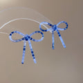 Slim Bow Stud Earrings In Brown Blue And White Patterns view 7