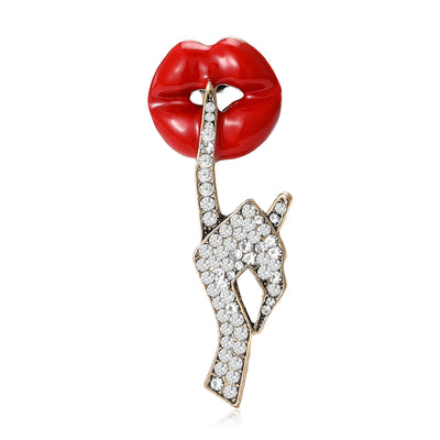 Product display showing glossy red lips above a crystal-covered pointing hand