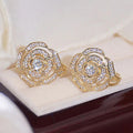 Sculpted Rose Clear Stone Stud Earrings In Gold And Silver Tones view 6