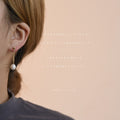 Gold Tone Fine Chain And White Pearl Like Drop Stud Earrings view 2