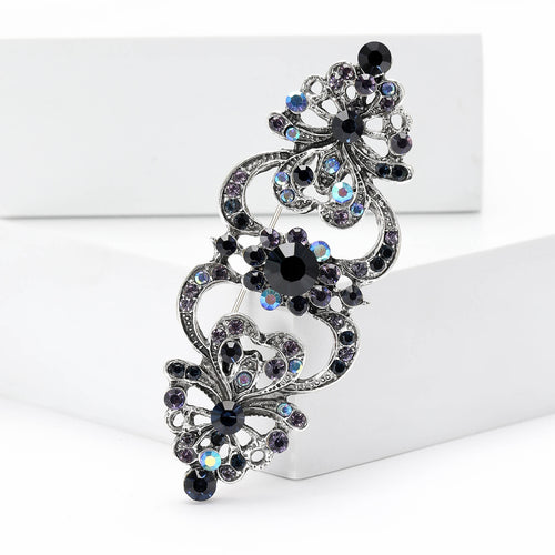 Dark blue filigree bar brooch front detail