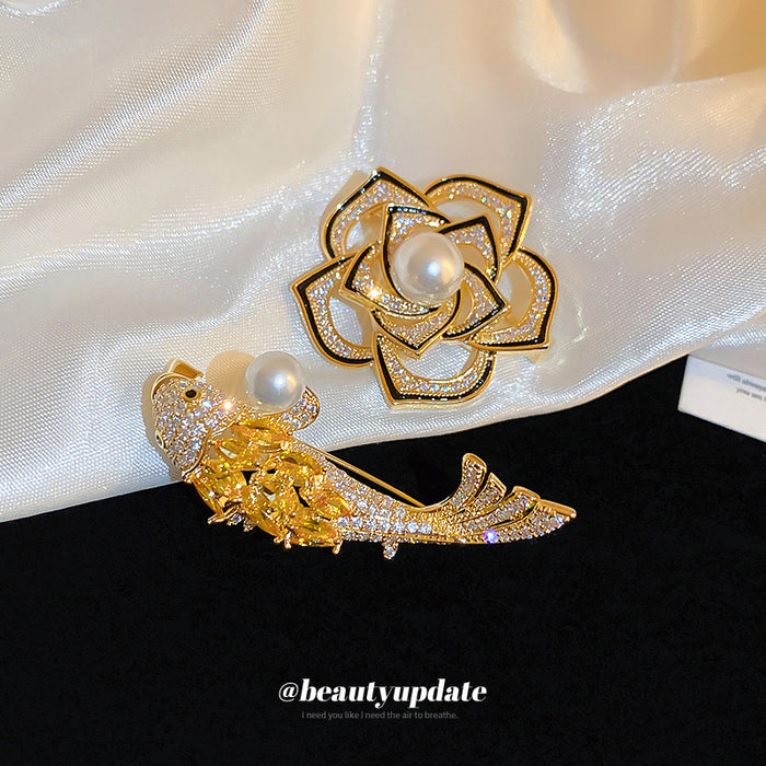 Gold Tone Crystal Fish Brooch With Pearl Like Orb Detail