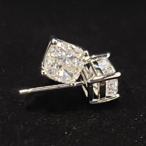 Side view of cushion clear stud earring showing post and open gallery