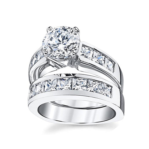 Side view silver round solitaire with channel-set companion wedding band