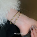 Three Gold Tone Flower Crystal Chain Bracelets And Slim Hinged Bangle view 2