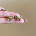 Small Flocked Horse Stud Earrings In Black And Burgundy view 3