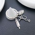 Two Silver Tone Syringe Stethoscope and Heart Keychains view 4