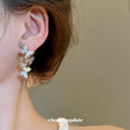 Silver Butterfly Cascade Stud Earrings With Blue Accents view 3