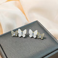 White and Crystal Look Triple Butterfly Stud Earrings view 1