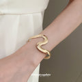 Five Mixed Wave Geometric And Twisted Wire Open Cuff Bracelets view 3