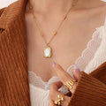 Gold Beaded Chain Oval Mirror Pendant Necklace With Rose Engraving view 1
