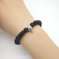 Black Beaded Elastic Bracelet With Silver Tone Skull Accent view 3