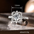 Silver Tone Floral Halo Ring With Round Clear Center view 5