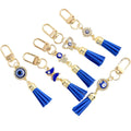 Gold Tone Evil Eye Charm Keychain with Blue Tassel and Rhinestone Accents view 5