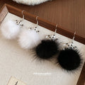 Snowflake Faux Fur Pom Pom Drop Earrings in White and Black view 2