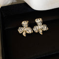 Gold And Silver Floral Stud Earrings In Three Sculpted Designs view 7