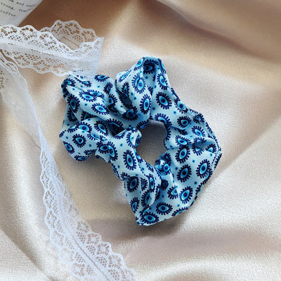 Main product view of blue Evil Eye Printed Satin Scrunchie Hair Accessory