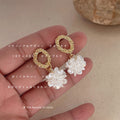 Gold Tone Textured Oval Stud Earrings With Pearl Flower Drops view 1