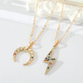 Gold Tone Multicolor Crystal Lightning and Crescent Horn Necklaces view 1