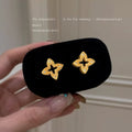 Gold Ribbed Openwork Four Petal Flower Studs Clear Stones view 1