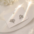 Silver Pave Crystal Twisted Knot Stud Earrings Pair view 4