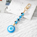 Evil Eye Bead Strand and Round Pendant Clip Keychains in Five Colors view 2