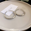 Multi Hoop and Twisted Hoop Earrings in Eight Metallic Styles view 12