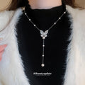 Silver Tone Butterfly Necklace with Pearl Look Stations and Drop view 1
