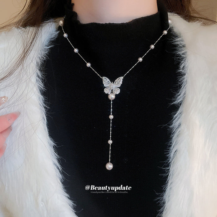Silver Tone Butterfly Necklace with Pearl Look Stations and Drop