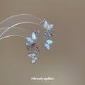 Silver Butterfly Cascade Stud Earrings With Blue Accents view 2