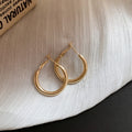 Polished Metal Teardrop Hoop Earrings in Six Size and Color Options view 6