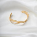 Matte Gold Tone Crossing Ribbon Open Cuff Bracelet view 2