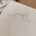 Bow Outline Drop Hook Earrings In Gold And Silver With Decorative Metal Details view 6