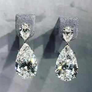 Long Clear Pear-Shaped Drop Earrings In Polished Silver Tone