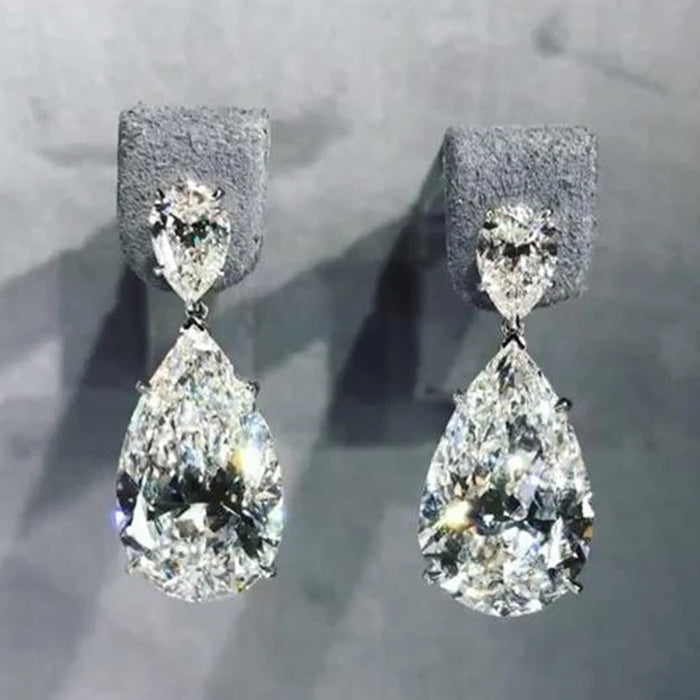 Long Clear Pear-Shaped Drop Earrings In Polished Silver Tone