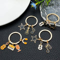 Four Guitar Keyboard and Headphone Metal Keychain Designs view 2