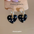 Gold Tone Crystal Heart Drop Huggie Earrings in Two Colors view 3