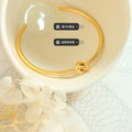 Open Knot Cuff Bangle Thick Wire Gold Or Steel Tone view 2