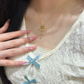 Gold Tone Rocking Horse Pendant Necklace with Chain Tassels view 3