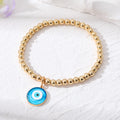 Gold Tone Bead Stretch Bracelets with Round Evil Eye Charms view 8