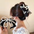 Black Pearl Bow Headband and Star Claw Clip Accessories view 3