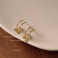 Gold Double Hoop Dual Heart Charm Stud Earrings Pair view 3