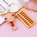 Gold Tone Abacus Keychain with Enamel Ruyi and Crystal Accents view 2