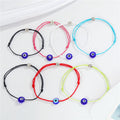 Round Blue Evil Eye Cord Bracelets in Six Bright Colors view 1